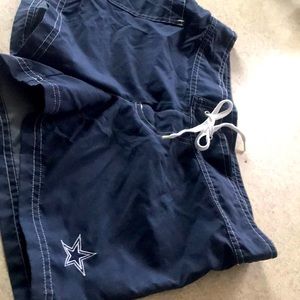 Cowboys NFL team woman’s swim shorts small.